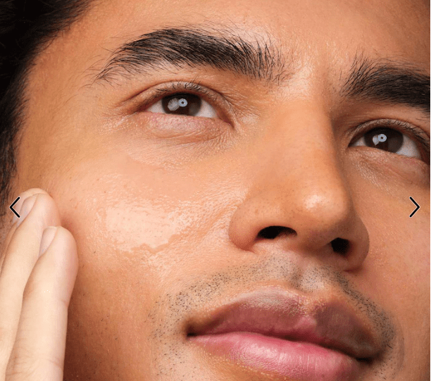 a man showing glowing hydrated skin