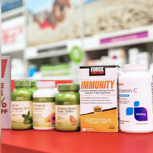 GNC Vitamin C 1000mg Caplets bottle in the line of other bottles