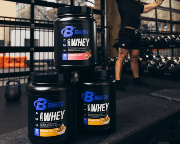 3 signature whey protein bottles in gym